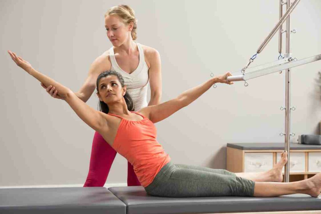 Woman doing Pilates for rehabilitation